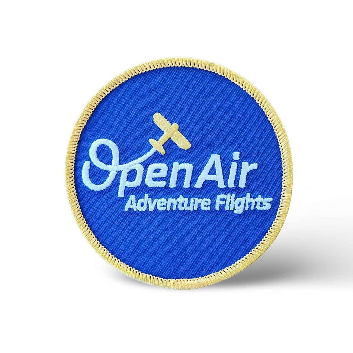 Embroidered Open Air Adventure Flights logo patch featuring the brand’s signature aviation design.